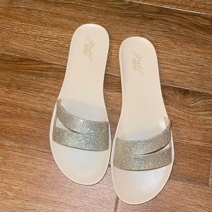 Brand new, never worn gold  Badgley Mischka slide size:10